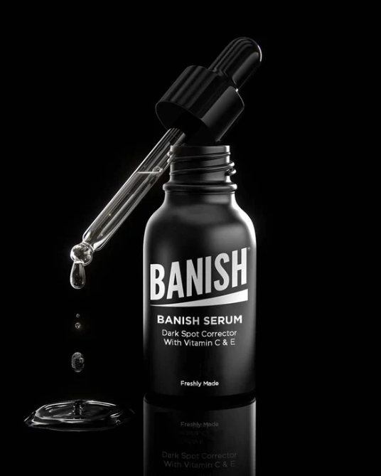 Banish Serum - Dark Spot Corrector Vitamin C Serum bottle on a modern background