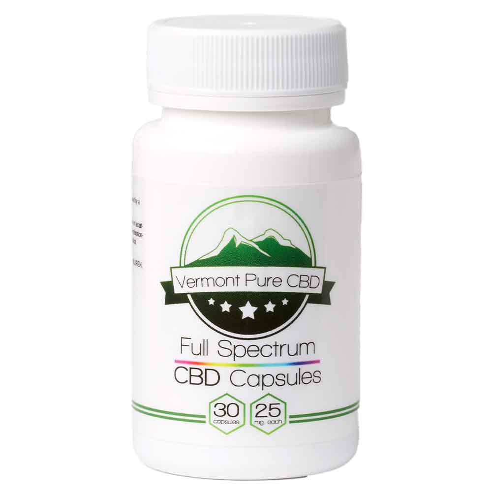 CBD 25mg Capsules by Vermont Pure CBD bottle on a nature-inspired background
